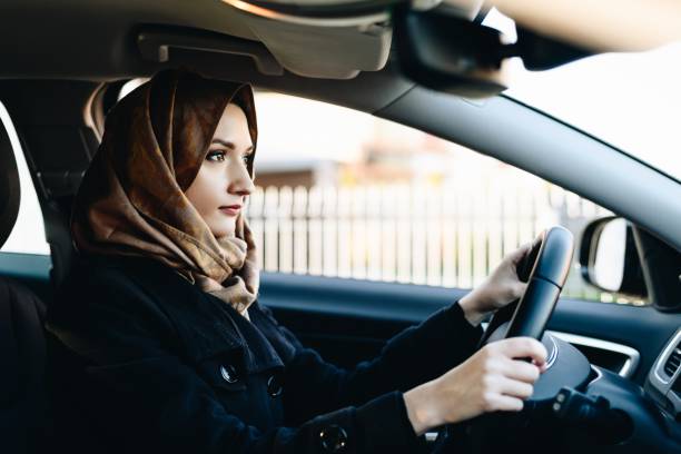 istock Muslim woman in car as driver 1088253500