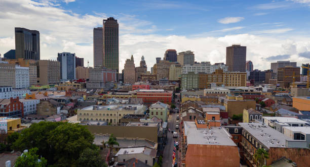 istock The Sun Peaks out through storm clouds lighting downtown New Orleans 1088255152