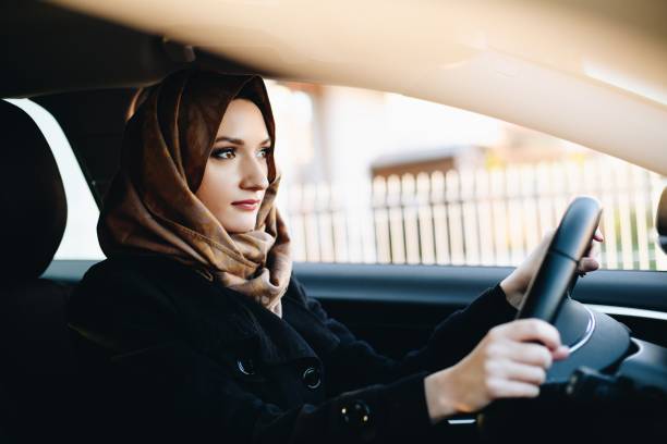 istock Muslim woman in car as driver 1088256648