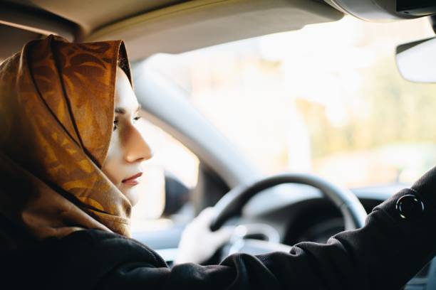 istock Middle eastern ethnicity woman in car as driver 1088256794