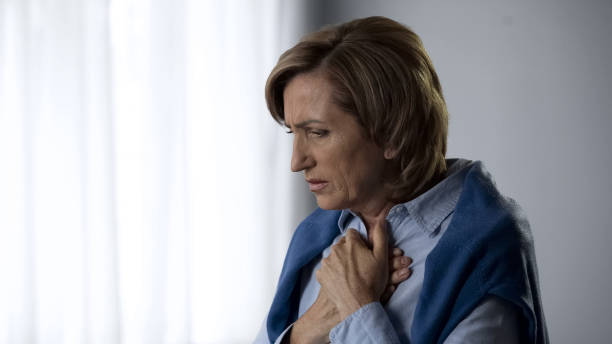 istock Extremely worried aging female suffering chest pain, emotional experience 1088258756