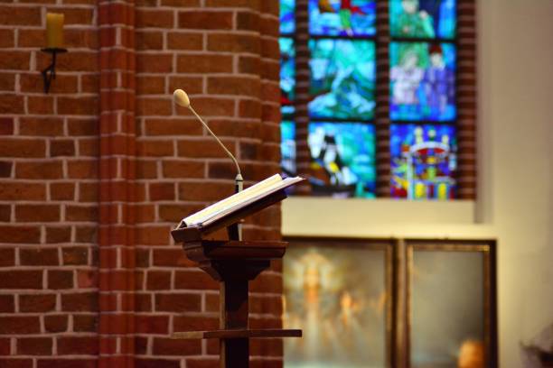 Beautiful artwork inside a Catholic church with colorful stained glass windows