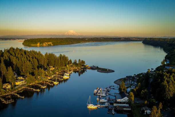 Gig Harbor Washington Aerial Golden Hour Aerial view of Gig Harbor entrance around sunset plus Mt Rainier puget sound aerial stock pictures, royalty-free photos & images