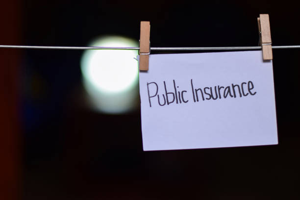 istock public insurance handwriting on paper. 1088300980