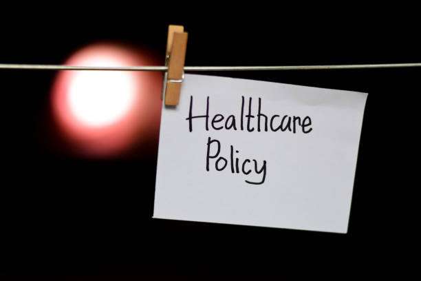 istock Healthcare Policy handwriting on paper. 1088301014