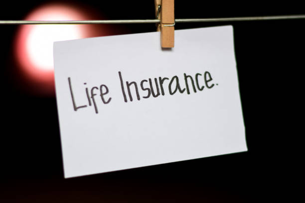 istock Life Insurance handwriting on paper. 1088302090