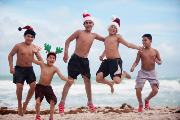 istock 5 brothers at the beach for Summer Christmas 1088309130