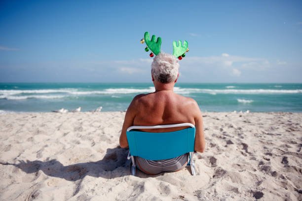Senior at the beach during Christmas time