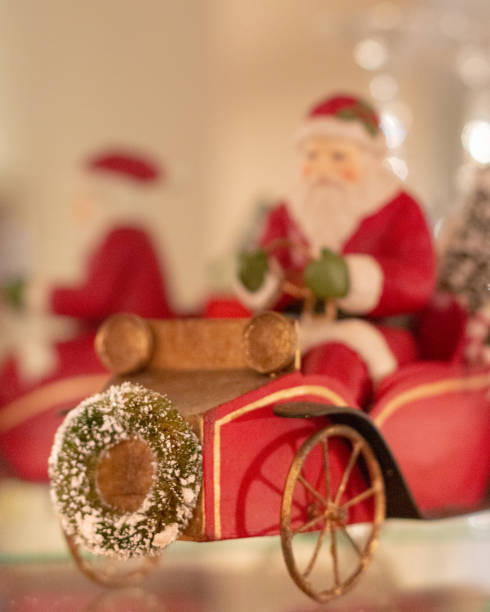 istock Santa Claus figurine in old car. 1088309376