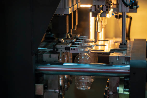 istock The  operation of  plastic bottle blowing process at the drinking factory. 1088310734