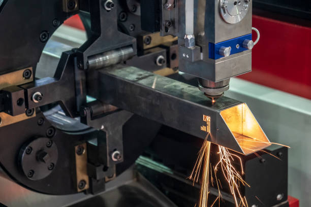 istock The CNC fiber laser cutting machine cutting the stainless square  pipe . 1088310752