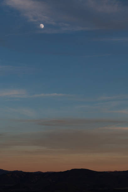 istock Moonrise over the Reno desert landscape. 1088324102