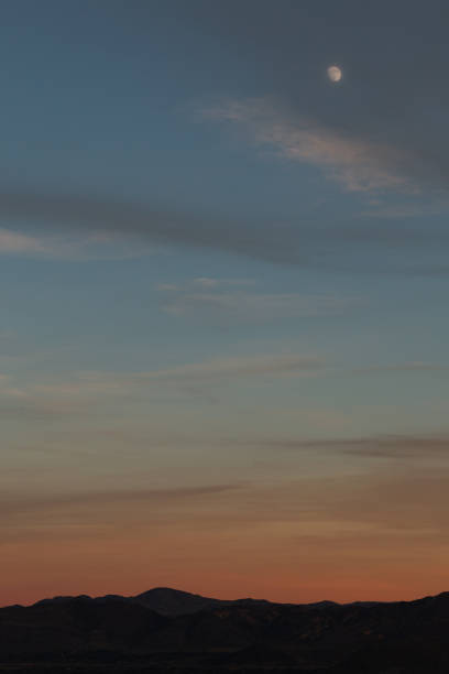 istock Moonrise over the Reno desert landscape. 1088324128