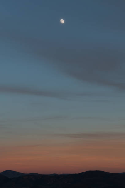 istock Moonrise over the Reno desert landscape. 1088324182