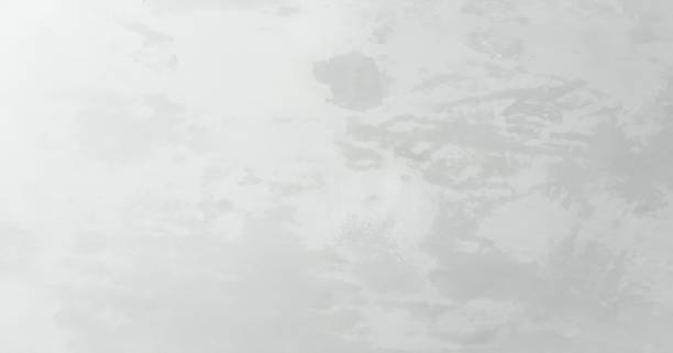 istock White washed painted textured abstract background with brush paint strokes in white and black shades. Abstract painting backgrounds. 1088324422
