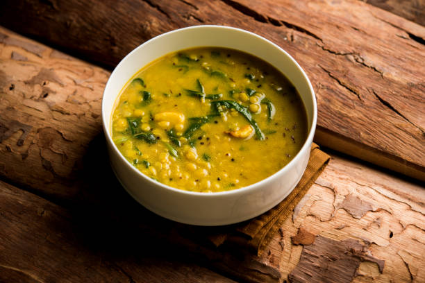 istock Dal Palak or Lentil spinach curry - popular Indian main course healthy recipe. served in a karahi/pan or bowl. selective focus 1088329082