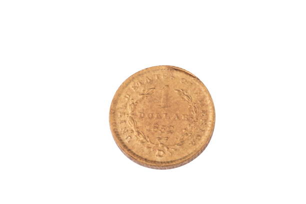 istock one gold 1852 dollar coin isolated on white background 1088329246