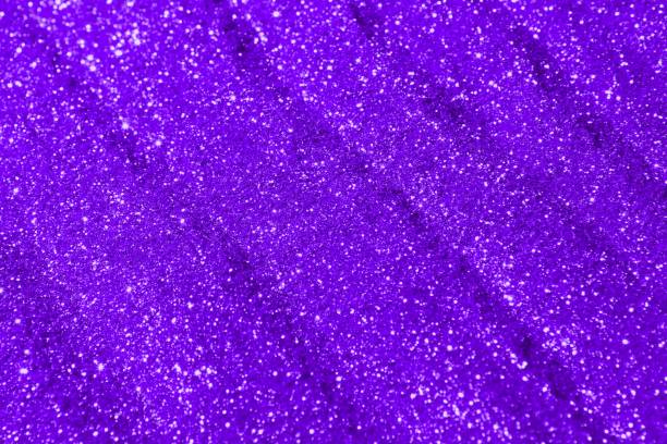 istock purple bright sand made of silver glitters with selective focus and small bokeh texture - wonderful abstract photo background 1088352914