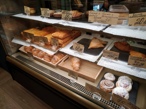 istock Various bakery food lie on shelves in a bakery shop 1088359632