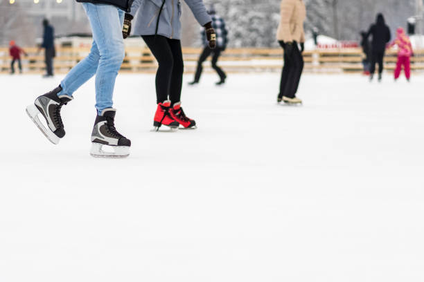 istock foot in skate on the ice 1088365220