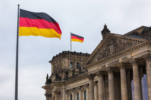 istock german flags waving near the german reichtstag 1088379234