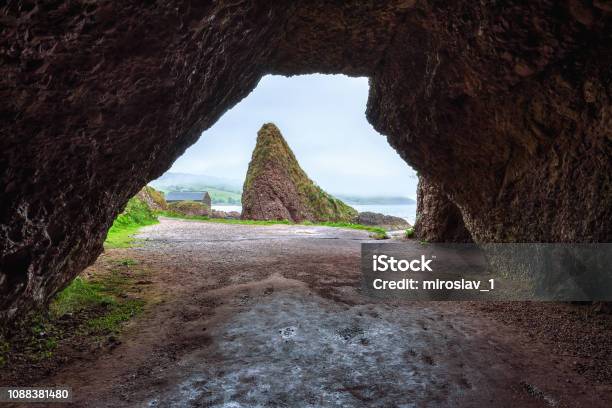 Cushendun Cave In Northern Ireland Stock Photo - Download Image Now - Cave, County Antrim, Northern Ireland