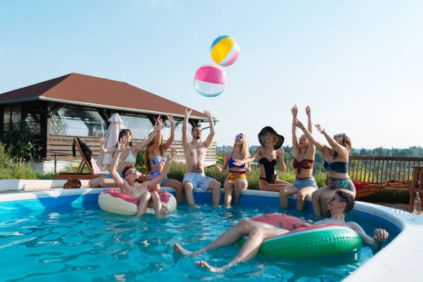 joy at the swimming pool - swimming pool party summer beach ball imagens e fotografias de stock