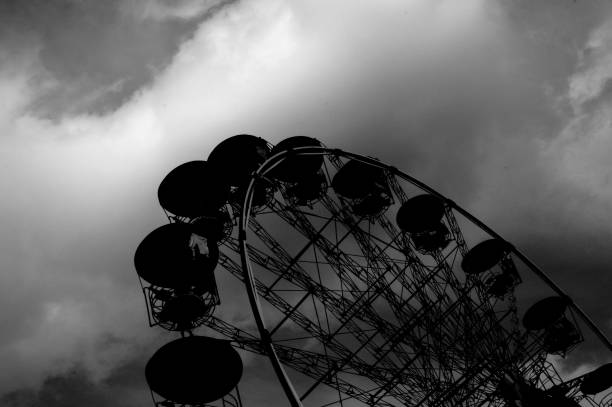 istock Carousel Ferris wheel silhouette, merry-go-round 1088388958