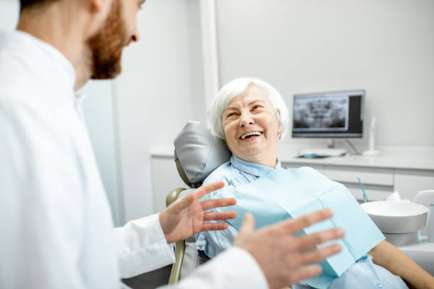 istock Elder woman during the consultation with dentist 1088392476