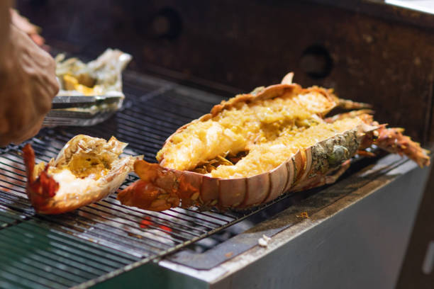istock Seafood being cooked on a grille. 1088401850
