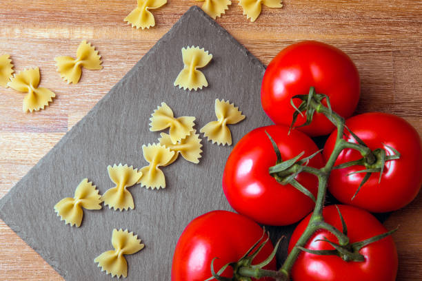 istock cook with tomatoes and noodles 1088403834