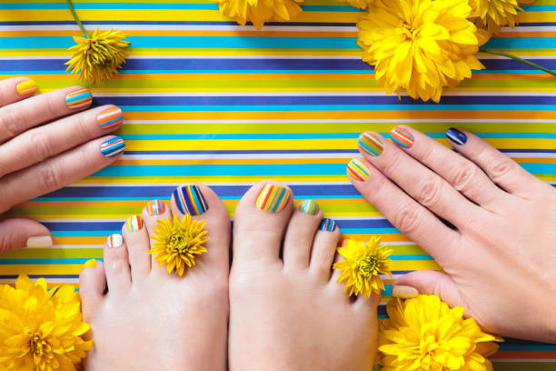 Colorful Striped Fashion Summer Pedicures And Manicures Stock Photo -  Download Image Now - iStock