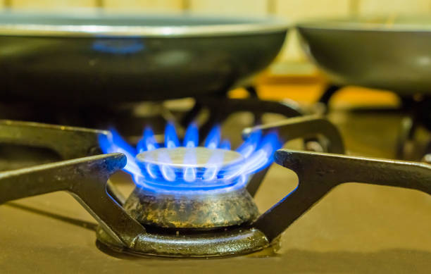 istock old fashioned lighted gas cooker, burning blue flames, retro kitchen equipment 1088413092