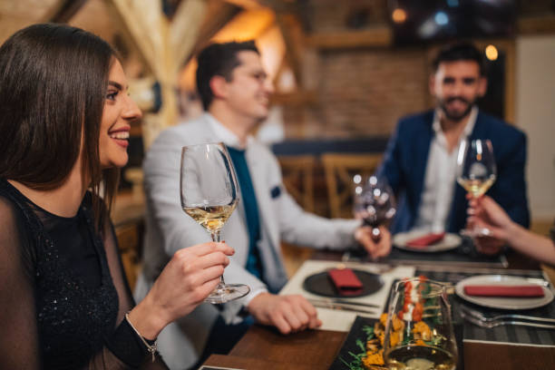 istock Happy friends drinking wine 1088415300