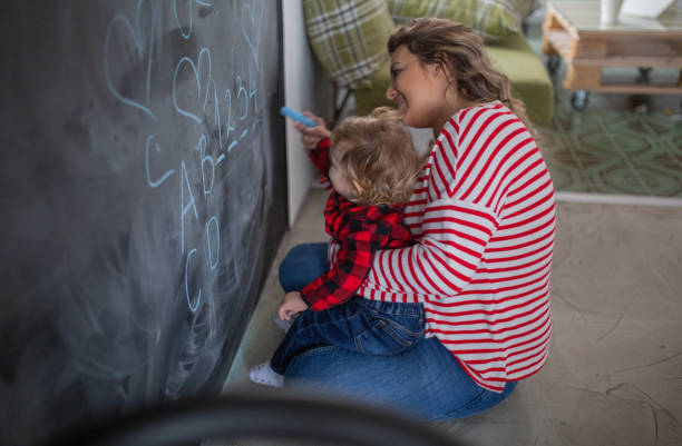 istock mother work´s and play with her child 1088415446