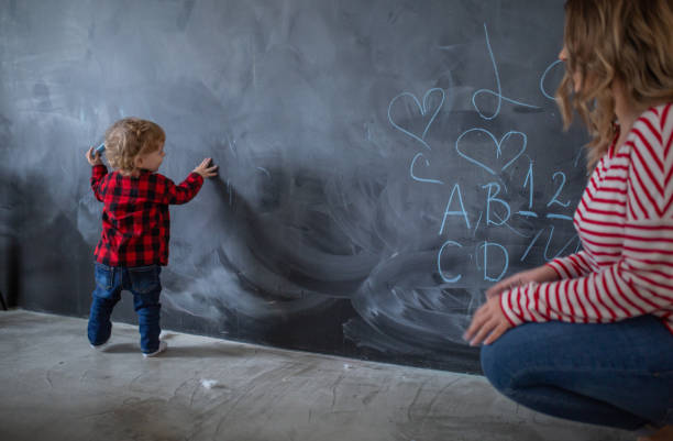 istock mother work´s and play with her child 1088417046