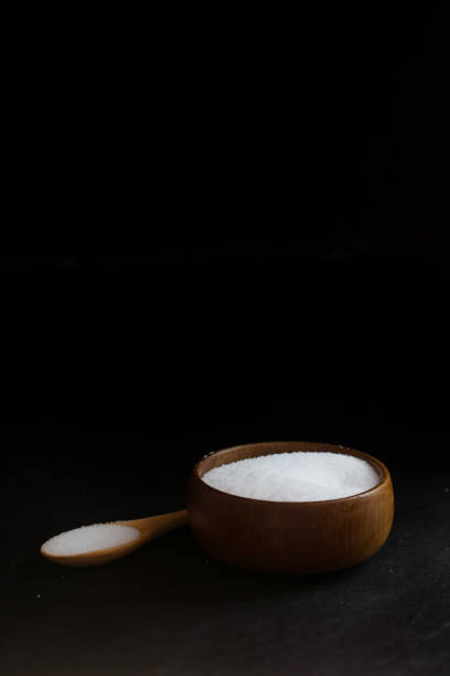 istock Salt in Cup made of wood with spoon 1088419352