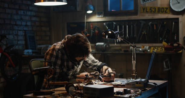 istock Man soldering drone in a garage 1088420896
