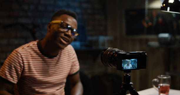 istock Young man talking on camera in a garage 1088420944
