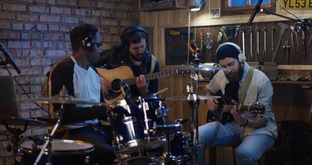 Young musicians rehearsing in garage