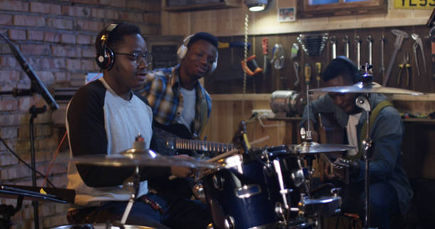 istock Young musicians rehearsing in garage 1088421254