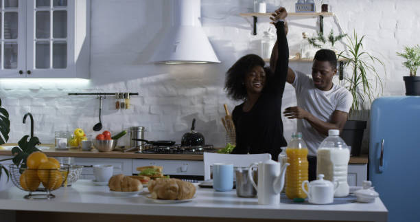 istock Couple dancing in the kitchen 1088421400