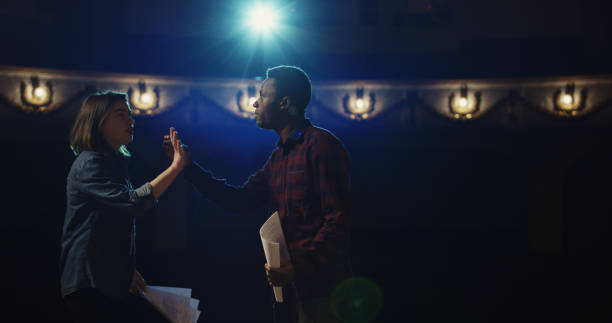 istock Actors rehearsing a scene in a theater 1088421900