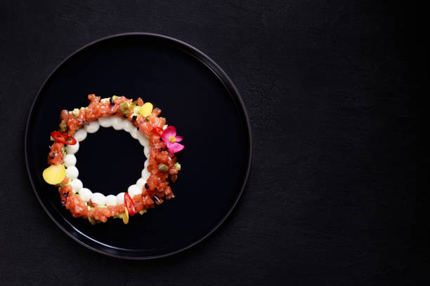 istock fish restaurant menu, salmon tartar with avocado 1088426918