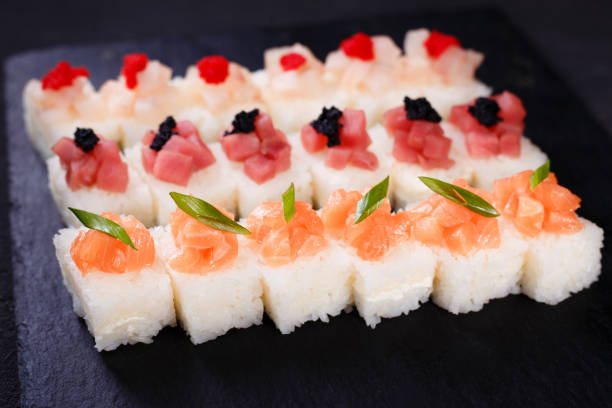 istock pressed tuna, scallop and salmon sushi set 1088426958