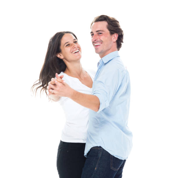 istock Attractive couple are happily dancing 1088436954