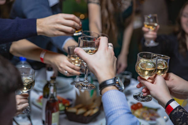 istock People clinking glasses at party. celebration on event 1088441400