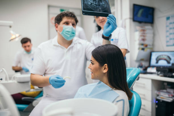 istock Dentist holding dental medical scan 1088454080