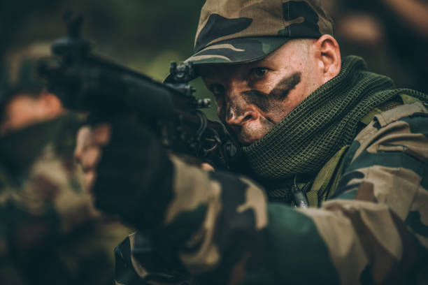 istock Military soldier shooting a weapon 1088458740
