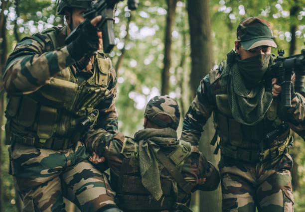 istock Soldiers Carrying Injured Man 1088459230